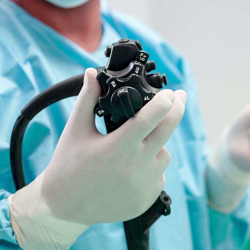 Doctor holding an endoscope